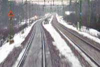 [#0092] dubbelspårig järnväg, snöstorm, snö, signalljus, tåg, X2000